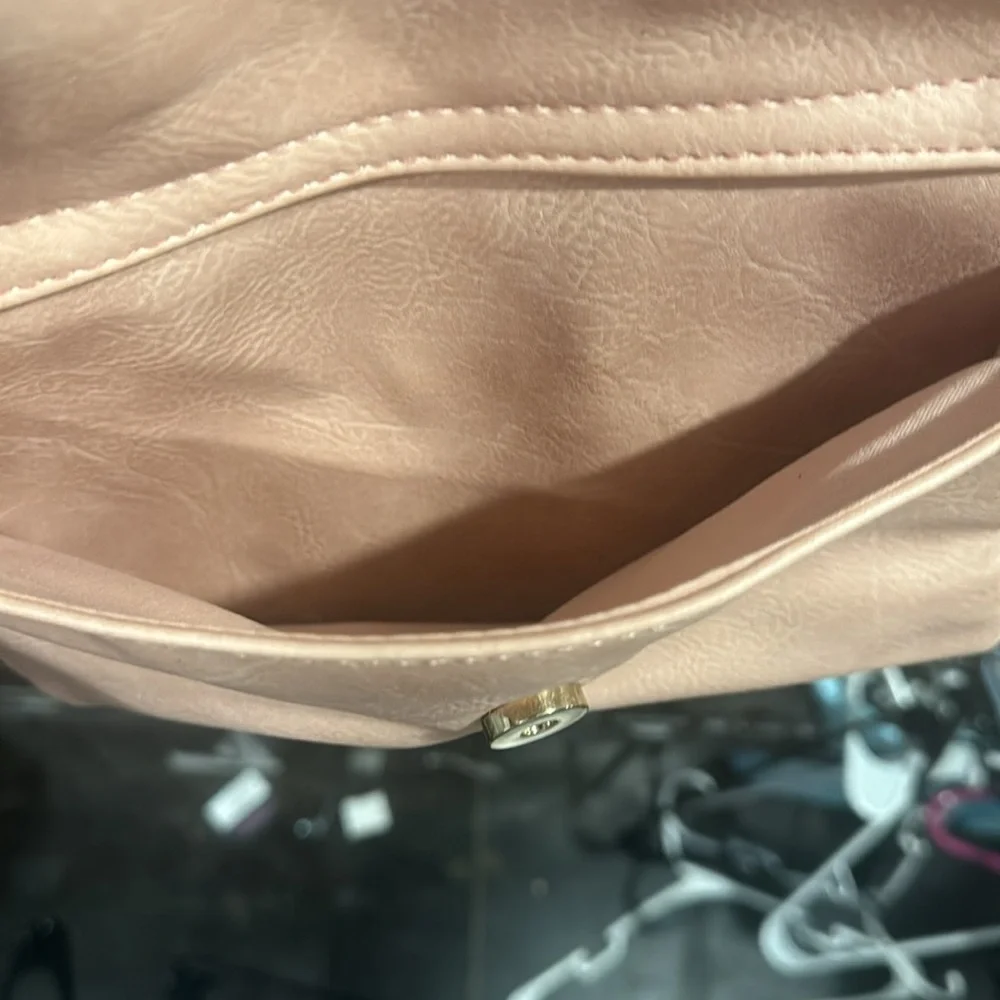 Blush perforated backpack